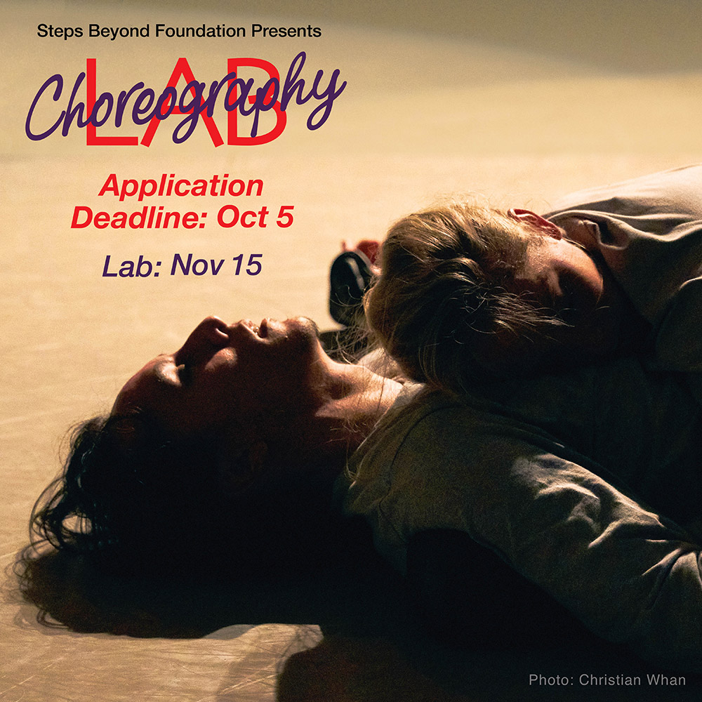 A couple lying on the floor in Steps Studio Theater at a Choreography Lap performance
