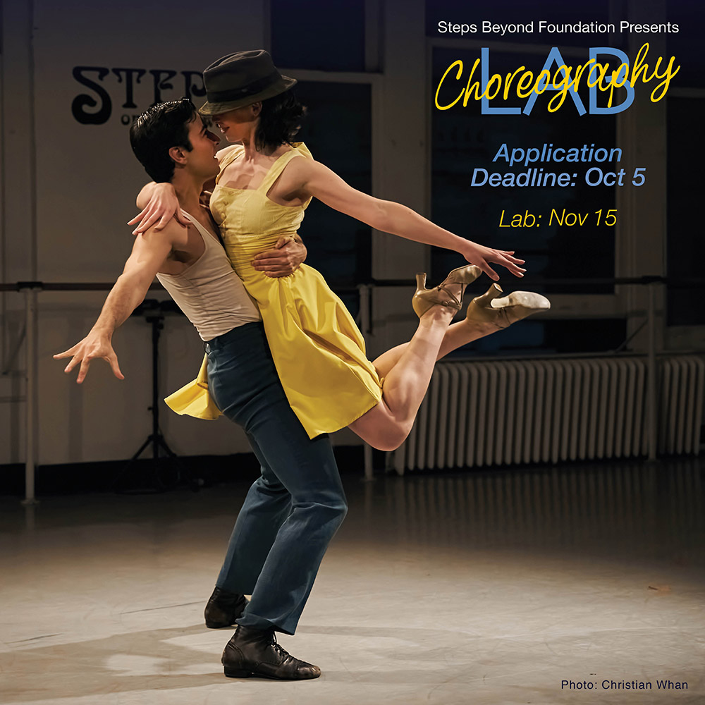 A male and female dancer on stage at Steps Studio Theater, she is in yellow and leaping into his arms.