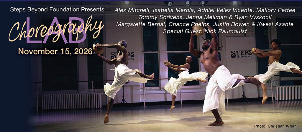 A group of dancers all in white facing the audience with arms and legs spread joyously wide