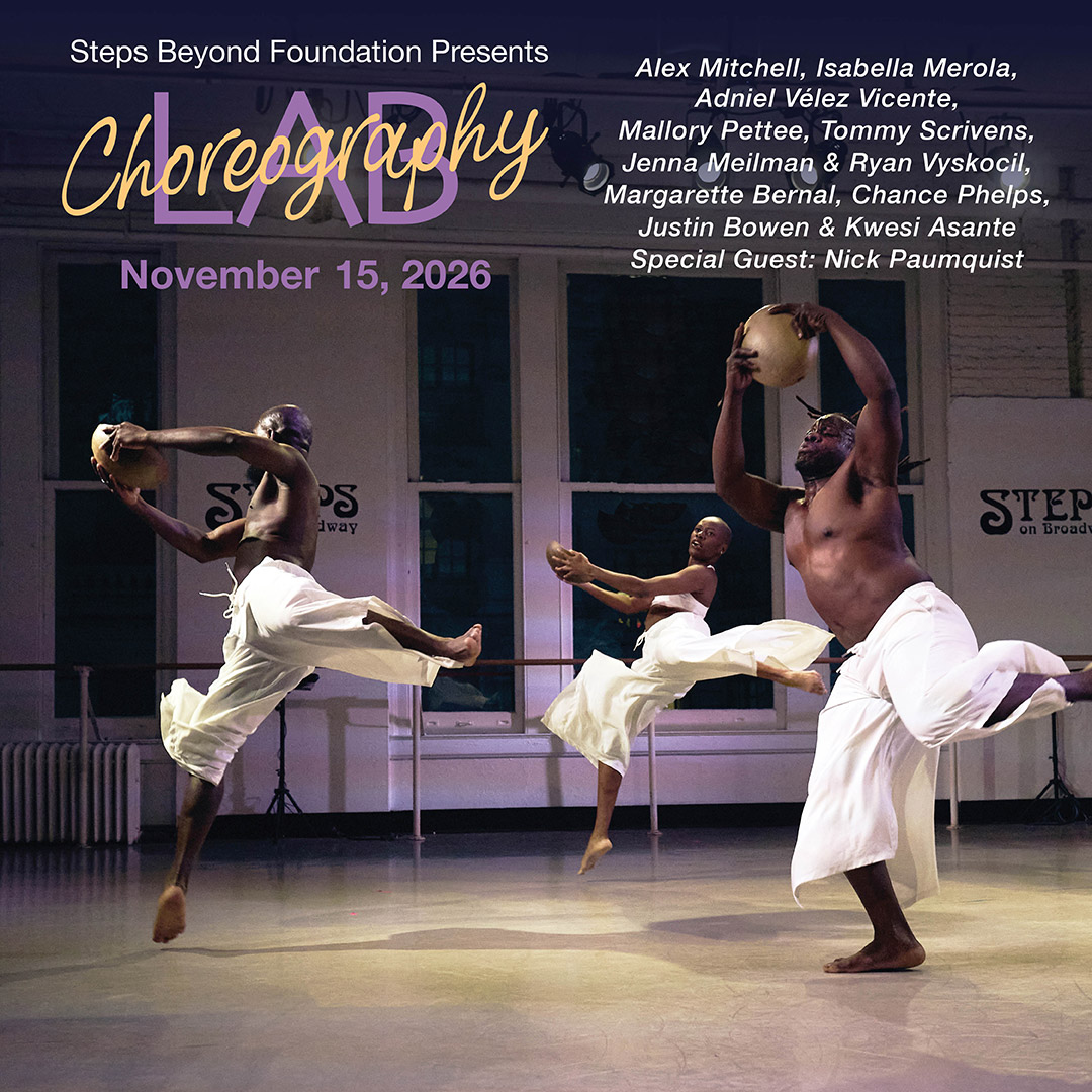 A group of dancers all in white facing the audience with arms and legs spread joyously wide